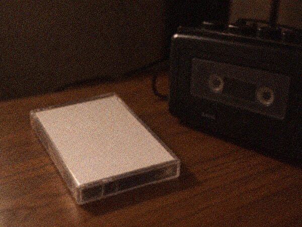 A cassette tape and a tape recorder.