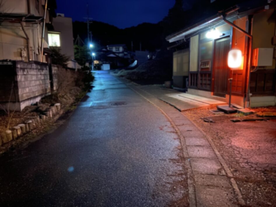 A lane at night, and a lantern.